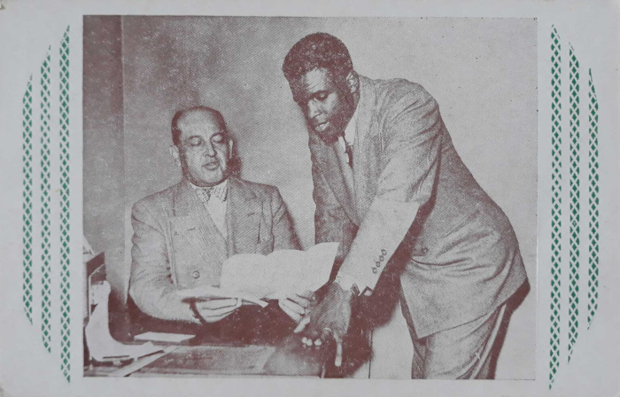 Jackie Robinson signs historical business insurance policies in Chicago