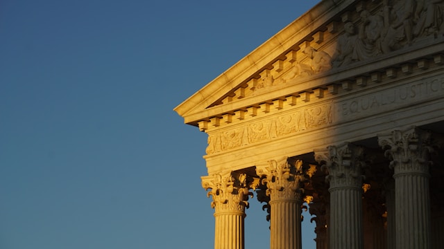The sun sets on the exterior of the Supreme Court, where decisions impacting Illinois insurance are frequently made.