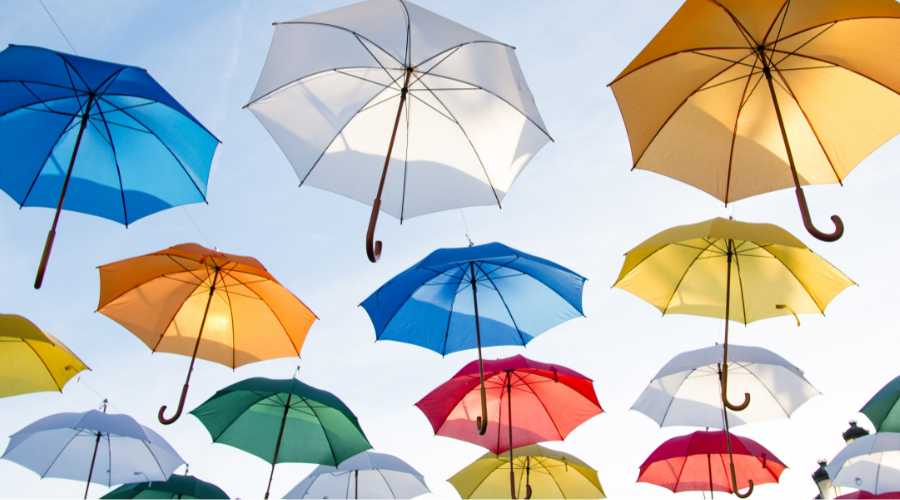 A series of colored umbrellas, as unique as the right kinds of umbrella insurance policies in Illinois